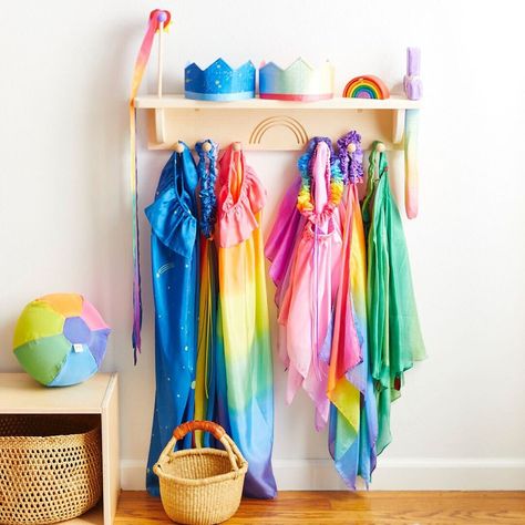 Our NEW Wooden Dress-up Display! The perfect addition to your playroom and invites hours of open-ended play!🌈 ⭐ 6 pegs to hold your dress-ups ⭐ 1 slot to fit your soft silk sword ⭐ 3 holes to display your streamers #sarahssilks #dressup #playsilks #playroom #openendedplay Montessori Room Ideas, Wooden Dress, Dress Up Area, Scarf Rack, Montessori Room, Christmas World, Track Toy, Traditional Toys, Play Furniture