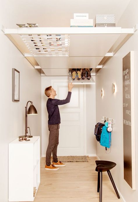 15 Storage Ideas for Small Spaces - RTF | Rethinking The Future Overhead Storage Ideas, Storage Ideas For Small Bedrooms, Peg Board Walls, Ceiling Storage Rack, Ideas For Small Bedrooms, Storage Ideas For Small Spaces, Wall Storage Cabinets, Ceiling Storage, Load Bearing Wall