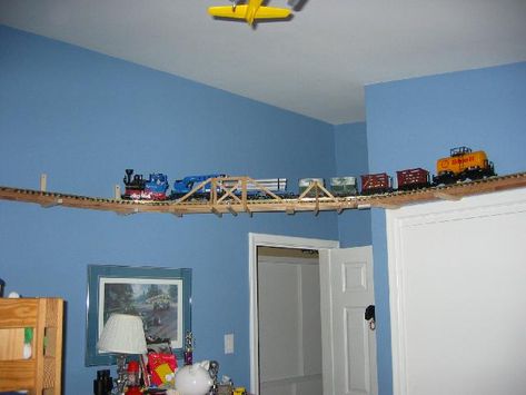 Train Around Room, Diy Train Bed, Ceiling Train, Boys Train Room, Train Bed, Boys Room Mural, Wooden Train Track, Fun Room, Boy Toddler Bedroom