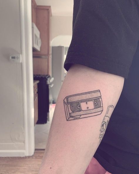 VHS tape 11rl 5rl 6hybrid Hand tattoos, Hand poked tattoo, Body art Vhs Tattoo Ideas, Vhs Tape Tattoo, Vhs Tattoo, Scattered Tattoos, Tattoos Outline, Tape Tattoo, Family Disappointment, Stick N Poke Tattoos, Girl Tattoo Ideas