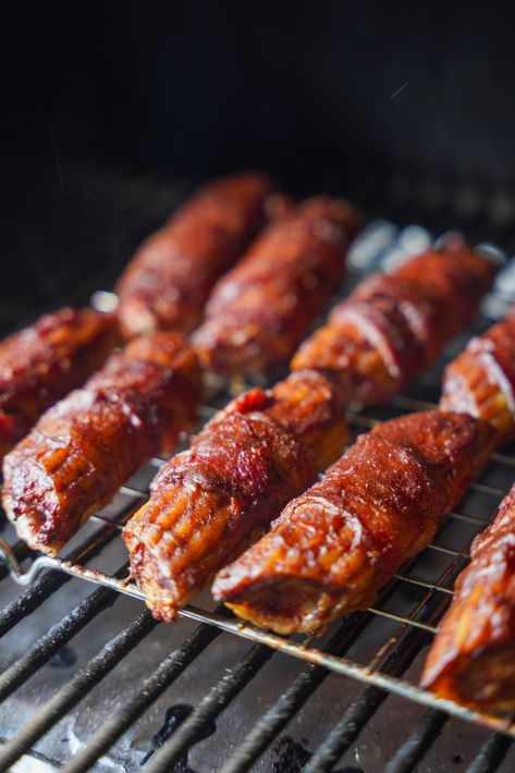 A hearty venison appetizer featuring ground a venison and cheese mixture stuffed into manicotti shells, wrapped in bacon then smoked and lathered in your favorite barbecue sauce. Shotgun shells have been all over my social media pages. Even my friends made them before me, so I HAD to jump on the bandwagon and try my... Ground Deer Meat Appetizers, Deer Appetizers, Ground Venison Appetizers, Venison Appetizer Recipes, Smoked Shotgun Shells, Manicotti Shells, Venison Meatballs, Deer Meat Recipes, Wrapped In Bacon