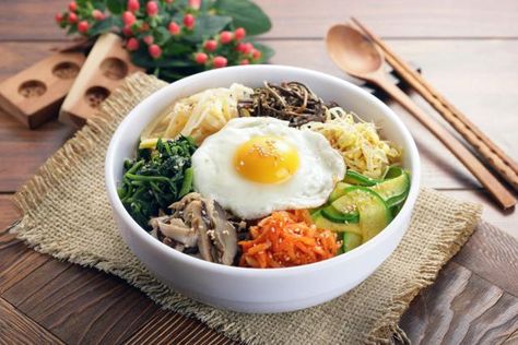 Bibimbap is delicious, gorgeous on the plate, and easily tweaked for different palates and spice levels. I've included six vegetables in this recipe, but you can easily make it with just 3 or 4 or what you happen to have in your fridge. Koreans usually eat this rice dish with some beef, but I usually top mine with just an egg fried sunny side-up. Korean Bibimbap, Bibimbap Recipe, Mixed Rice, Korean Food Recipes, Bulgogi Beef, Korean Cooking, Korean Restaurant, Restaurant Dishes, Meal Planning Ideas