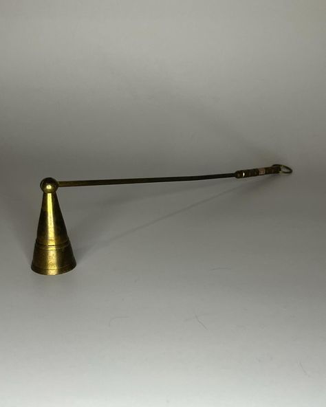 🕸️vintage pivoting brass cone shaped candle snuffer 🕸️in great vintage condition; original patina. can be polished upon request. sticker says made in india 🕸️12in long x 2.5in tall 🕸️link in bio to purchase • • • • #vintage #brassobsession #antique #antiquestore #smallbusiness #supportsmallbusinesses #homedecor #forsale #arizona #phoenix #etsy #glass #vase #collectables Shaped Candle, Candle Snuffer, Candle Shapes, Antique Stores, Phoenix, Glass Vase, Link In Bio, Patina, Arizona