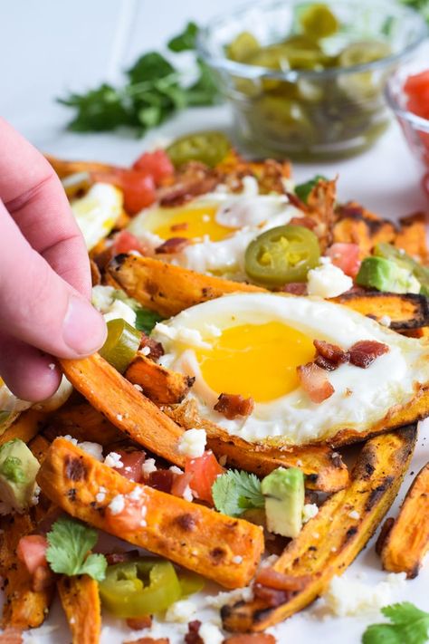 Baked Loaded Sweet Potato Breakfast Fries topped with sunny side up eggs, bacon, avocados and cotija cheese are sure to be your new favorite weekend breakfast. Breakfast Fries, Sunny Side Up Eggs, Potato Breakfast, Better Breakfast, Fried Breakfast, Loaded Sweet Potato, Loaded Fries, Sweet Potato Breakfast, Cotija Cheese