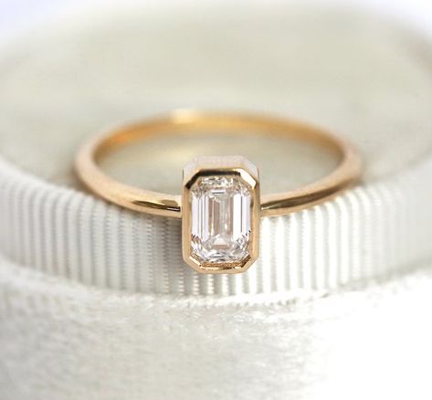 Emerald cut engagement rings are a classic, eye-catching choice with a wedding band or without. This diamond cut is having… 5 Ct Diamond Ring, 5 Carat Diamond Ring, Engagement Ring Emerald Cut, Emerald Cut Diamond Engagement Ring, Engagement Ring Emerald, Emerald Cut Diamond Engagement, Unique Wedding Ring, Ring Emerald Cut, Emerald Cut Engagement