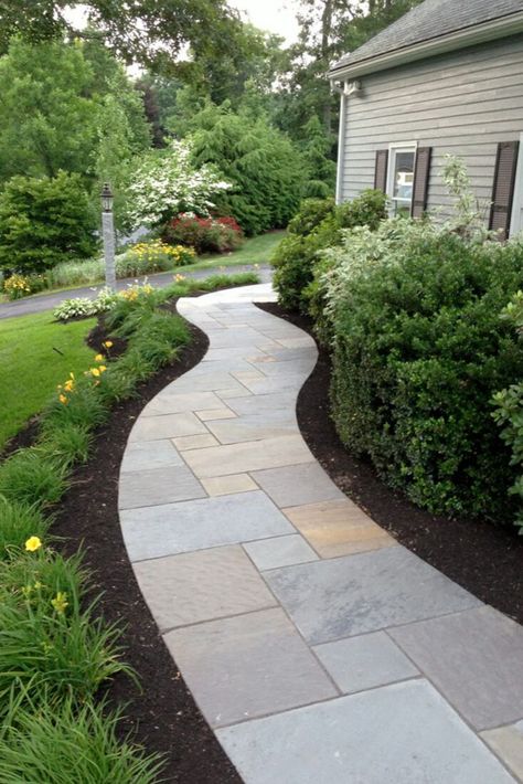 Thinking of creating a new landscape in your front yard? Check out our gallery featuring 15 unique ideas that will help improve your curb appeal. #frontyard #landscapingideas #backyarddesign #homedesigning Front Walkway Landscaping, Bluestone Walkway, Side Walkway, Front Yard Walkway, Gravel Walkway, Flagstone Walkway, Cheap Landscaping Ideas, Backyard Walkway, Walkway Landscaping