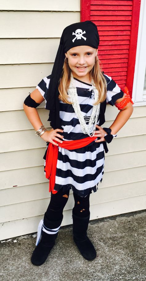 Easy girl's pirate costume made from cheap adult size "prisoner" costume and an old t-shirt. Diy Girls Pirate Costume, Diy Pirate Costume For Women, Diy Pirate Costume, Pirate Man, Diy Pirate Costume For Kids, Homemade Pirate Costumes, Pirate Dress Up, Diy Costumes Kids Boys, Pirate Costume Kids