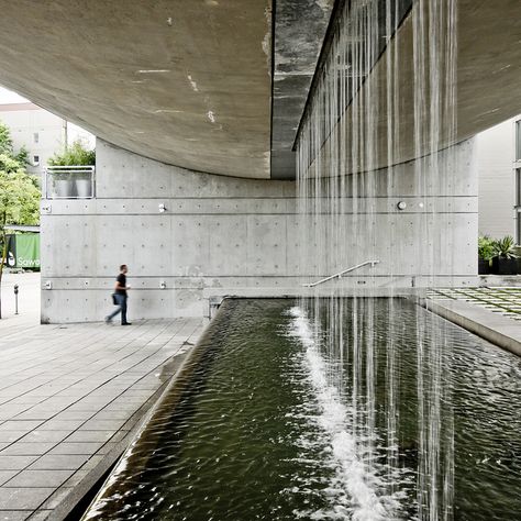 Waterfall Building, near Granville Island - another great creation by Arthur Erikson. (Photo credit: Scott Norsworthy http://www.flickr.com/photos/scottnorsworthy/) Water Building Architecture, Building Waterfall, House Water Feature, Waterfall Interior, Interior Waterfall, Arthur Erickson, Waterfall Building, Waterfall Ideas, Water Architecture