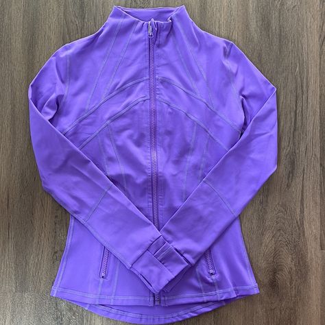 Whether You Are Working Out Or On The Go, Our Premium Lightweight Yoga Jacket Is A Great Addition To Have . This Stylish Compression Fit Contours The Body As You Stretch. It Is Soft, Comfortable, And Provides A Nice Refined Look. - Breathable - Sweat Wicking - Four Way Stretch - Quick Dry - Thumbholes - Zippered Pockets Materials: - 87% Nylon - 13% Spandex Care: - Wash With Like Colors - Machine Wash Cold - Tumble Dry Low - Do Not Bleach - Do Not Iron - Do Not Dry Clean Lululemon Outfit Fashion, Lulu Tops, Workout Jackets, Lulu Fits, Cheer Practice Wear, Purple Lululemon, Lululemon Purple, Yoga Jacket, Lululemon Outfits