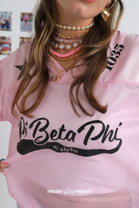 Our july lookbook has dropped! Come see what your favorite creators designed, and customize cute, trendy, and affordable merch for your organization! Pi Beta Phi, piphi, piphi sorority, sorority jersey, custom jersey, pink jersey, y2k sporty, y2k jersey, sorority merch, custom sorority merch, trendy merch, cute merch, merch ideas, merch inspo, trendy merch ideas, sporty sorority, sorority events, sorority outfits, uni life, college checklist, college girl outfits, college girl style, trendy gir Sorority Football Jersey, Sorority Jersey Outfit, Sorority Merch Sets, Cute College Merch, Sorority Jersey, Merch Outfits, Girly Graphic Design, Trendy Merch, Outfits Uni