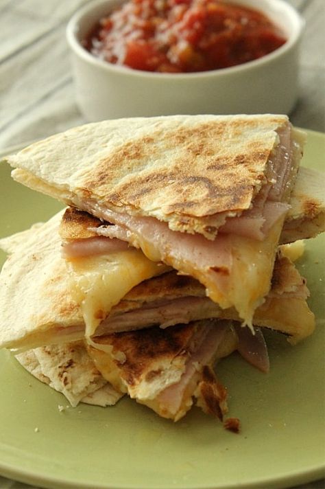 Easy Ham and Cheese Quesadillas made with 3 ingredients and perfect for a quick lunch or snack! Flour tortillas topped with deli ham and Mexican cheese! | The Bitter Side of Sweet Cheese Quesadillas, Easy Ham, Cheese Quesadilla, Easy Chocolate Chip Cookies, Pumpkin Chocolate Chip Cookies, Quesadilla Recipes, Quick Lunches, Ham And Cheese, Wrap Sandwiches