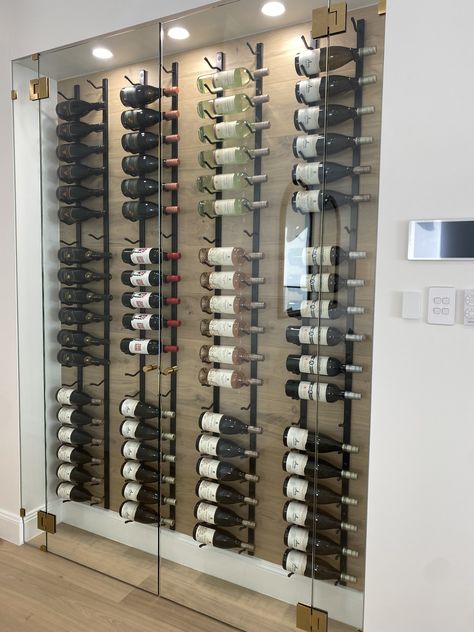 Glass Wine Cooler Wall, Indoor Wine Cellar, Modern Wine Wall Display, Glass Enclosed Wine Wall, Wine Cellar Wall Dining Room, Wine Under Stairs, Glass Wine Wall, Wine Cellar Modern, Wine Cellar Ideas