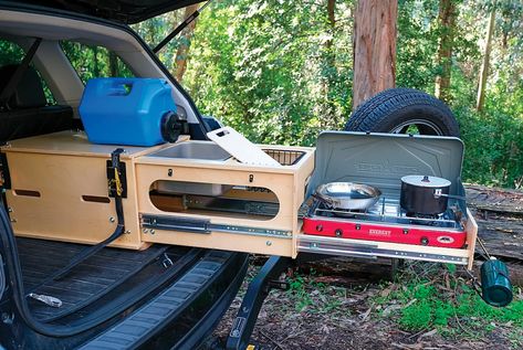 This Pull-Out Kitchen Turns Almost Any SUV into a Great Car Camper • Gear Patrol Astuces Camping-car, Kangoo Camper, T3 Vw, Suv Camper, Auto Camping, Minivan Camping, Truck Bed Camping, Camper Kitchen, Truck Bed Camper