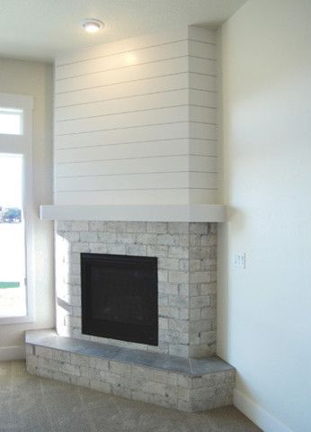 San Savino - Family Room with Corner Fireplace - Transitional - Family Room - Boise - by Gallery Homes by Varriale | Houzz Family Room With Corner Fireplace, Corner Brick Fireplaces, Room With Corner Fireplace, Corner Stone Fireplace, Corner Fireplace Living Room, Corner Fireplace Ideas, Craftsman Dining Room, Corner Electric Fireplace, Transitional Family Room