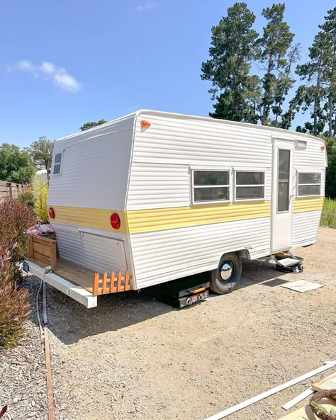 White and yellow camper after makeover Vintage Camper Redo, Small Travel Trailer Remodel, Small Travel Trailer, Board And Batten Exterior, Shasta Camper, Small Caravans, Small Travel Trailers, Coffee Trailer, Vintage Camper Remodel