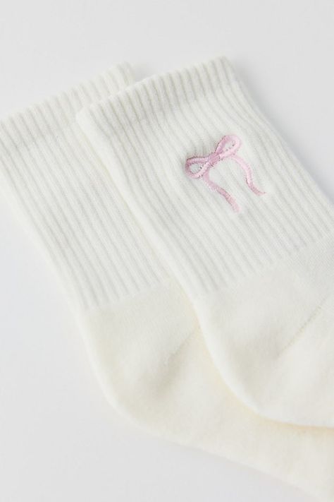 Ultra-soft crew socks with bow detailing at the ribbed cuff. Features Bow quarter crew socks Super soft crew socks Bow detailing at the ribbed cuff Content + Care 80% Cotton, 18% polyester, 2% spandex Machine wash Imported Size + Fit Quarter crew length Fits US women’s shoe size 6–10 | Bow Quarter Crew Sock in White/Pink Bow, Women's at Urban Outfitters Cute Things For Wishlist, Trendy Stocking Stuffers, Girly Stocking Stuffers, Cute Pink Socks, Urban Outfitters Coquette, Pink Socks Aesthetic, Cute Crew Socks, Bows On Clothes, Clothes With Bows