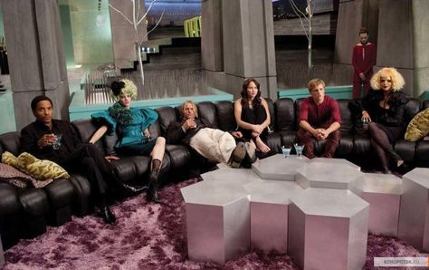 "The Hunger Games" stills: Cinna, Effie, Haymitch, Katniss, Peeta, Portia and an avox girl. Effie Trinket, Hunger Games Cast, Hunger Games Movies, The Mockingjay, Real Or Not Real, The Hunger Games Catching Fire, Katniss And Peeta, Hunger Games Series, Hunger Games 3