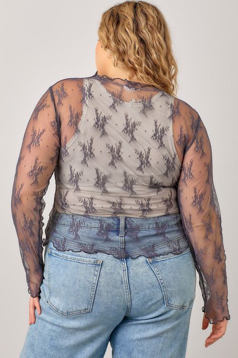 Our Plus Size Mesh Lace Long Sleeve Top is a layering dream! The delicate lace and sheer mesh sleeves make it perfect for adding a touch of elegance to any outfit. Pair it under dresses for a peek of lace, layer it with vests for a chic vibe, or wear it beneath low-cut sweaters and tops for a stylish contrast. The versatile design means endless outfit possibilities, making it a must-have piece for your wardrobe. Stylish, feminine, and oh-so-easy to mix and match! MODEL IS WEARING 1X Fabric Contents90% NYLON 10% SPANDEX Lace Tops Outfit, Lace Long Sleeve Top, Jean Jacket Vest, Tops Outfit, Mesh Long Sleeve Top, Lace Top Long Sleeve, Curvy Jeans, Lace Long Sleeve, Mesh Sleeves