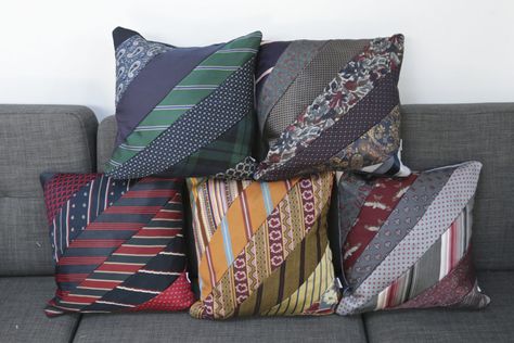 5 different colour schemes of cushions made from neck ties stacked on a sofa. Handwritten Gifts Ideas, Old Neck Ties, Necktie Quilts, Necktie Projects, Tie Projects, Tie Quilts, Tie Pillows, Necktie Quilt, Memory Items