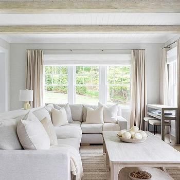 Interior design inspiration photos by Chango & Co.. Monochromatic Living Room, Wooden Beams Ceiling, White Couch, Popular Living Room, White Sectional, Plank Ceiling, Custom Furniture Design, Transitional Living, Wooden Ceilings