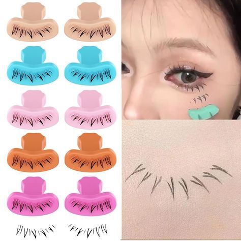 Color: as shown Package Included:1 pair Eyelash Stamp Material: Silicone Size: About (1.77*1.57in) Item Type: Lower Eyelash Stamp Stencil with Handle Suitable for: all skin types Product features: 1.Enhance your eye makeup game with our innovative lower lash stamp. Create scalloped, thick lower lashes in seconds. Get ready to captivate your mesmerizing eyes! 2.This is specially designed for your lower lashes to make them clearer and more attractive. 3.Say goodbye to smudging and smudging - Now you can highlight your lower lashes effortlessly with precision and ease. 4.Whether you spent 5 minutes or 30 minutes perfecting your look, the False eyelash applicator tool will keep you the same throughout the day! Note: 1.Due to manual measurement, please allow 1-3cm difference, thank you for your Make Up Beginner, Stamp Eyeliner, Mesmerizing Eyes, Diy Eyelash Extensions, Makeup Game, Lower Lashes, Natural Diy, Eyeliner Pen, Makeup Eyelashes