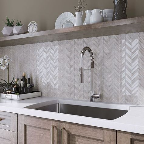 Glass backsplash tile is protective, low maintenance, and visually appealing all at once Chevron Backsplash, Trendy Kitchen Backsplash, Chevron Tile, Elegant Tiles, Kitchen Backsplash Designs, Glass Tile Backsplash, Timeless Kitchen, Backsplash Designs, Kitchen Tile