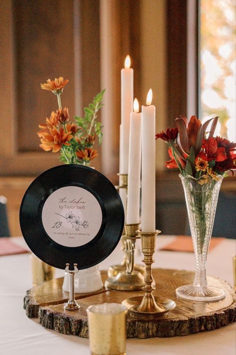 Music Wedding Theme Decoration, 45 Record Centerpieces, Vinyl Records Wedding Decor, Music Venue Wedding Reception, Wedding Ideas For Music Lovers, Jazz Age Wedding Theme, Vinyl Centerpieces Wedding, 50s 60s Wedding Theme, Records Wedding Decor