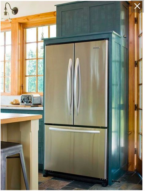 Fridge surround; fridge next to door; fridge next to window. Cabinet Around Fridge, Fridge Surround, Appliances Cabinet, Narrow French Doors, Cafe Appliances, Kitchenaid Appliances, Fridge Models, Slate Appliances, Fridge Cabinet