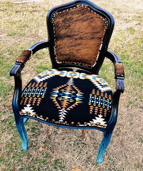 This Arm Chair is custom restored with a red brindle cowhide and Pendleton fabric. It has a turquoise Ombré wood finish and trimmed in antique copper nail heads. Order yours today $850 Southwestern Furniture, Southwest Furniture, Cowhide Furniture, Cowhide Chair, Southwestern Home, Western Furniture, Southwest Decor, Ideas Hogar, Western Homes