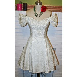 This is a genuine vintage short 80's wedding dress.  We could go something like this - it is still 80's looking with the puffy sleeves but more rock chick as it is short and off-white. Goth Wedding Dress Short, Short 80s Wedding Dress, Wedding Dresses From The 80s, 80s Wedding Dress Redesign, 80’s Wedding Dresses, Wedding Dresses From 1986, Goth Wedding Dresses, Goth Bride, Puff Sleeve Wedding Dress