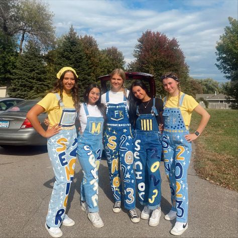 Homecoming Jeans Blue And Gold, Grad Coveralls Ideas, Blue And Gold Senior Jeans, Black And Gold Senior Jeans, Painted Overalls Senior Year, Senior Overalls Shorts, School Overalls Spirit, Senior Jeans Blue And Gold, Senior Year Overall Ideas