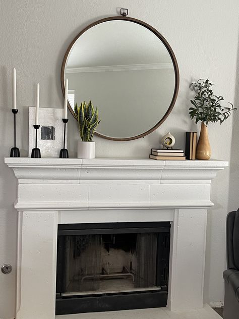 Decor On Top Of Fireplace, Mantle With Artwork, Mantle With Circle Mirror, Mantles With Round Mirrors, Scandi Fireplace Decor, Circle Mirror Above Fireplace, Living Room Fireplace Mantel Decor, Cream Fireplace Decor, Top Of Chimney Decor Fire Places