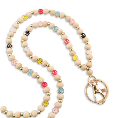 PRICES MAY VARY. 🥰 Bright & Cheerful Design: Features vibrant, handcrafted wooden beads with soft high-quality metal smiley faces, turning everyday wear into a fun and happy statement. 🥰 Lightweight & Practical: Crafted for comfort and convenience, this lanyard is ideal for securely holding badges, keys, and other essentials, making it both a functional and fashionable accessory. 🥰 Ideal Gift: Elegantly packaged, MyFavoriteK Lanyards are thoughtful presents suitable for everyone. - be it a wi Cheap Personalized Beaded Lanyards, Wooden Bead Lanyard, Diy Lanyards, Teacher Lanyard Personalized, Nurse Black, Teacher Lanyard Wood Beads, Teacher Lanyard Beaded, Beads Lanyard, Diy Lanyard