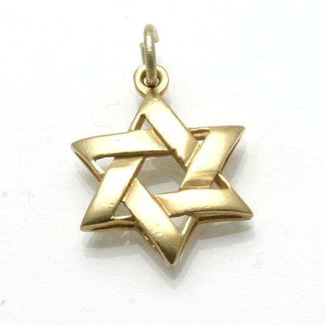 This stunning pendant is made of 14k yellow gold. It is a small woven Star of David with a smooth rounded finish. Makes a great bat-mitzvah piece or every day piece. Length (including bail): 3/4" Width: 1/2" Recommended chain: Cable chain Also available in sterling silver Jewish Star, Star Of David Pendant, Star Of David, Bat Mitzvah, Cable Chain, Bat, Cable, Yellow Gold, Sterling Silver