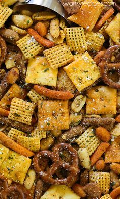 Cajun Chex Mix - For a taste of Cajun Country in Louisiana, try this spicy Cajun seasoning snack mix blend. Made with local Creole and Cajun seasoning from New Orleans, and pretzels, Cajun corn sticks, chex cereal, cheese crackers, and nuts. Everyone raves how amazing and easy this Chex Mix is. Perfect for the holiday season like Christmas and Thanksgiving. Ranch Chex Mix, Best Superbowl Food, Snacks Sweet, Healthy Superbowl Snacks, Oh Sweet Basil, Chex Mix Recipes, Snack Mix Recipes, Superbowl Snacks, Superbowl Party Food