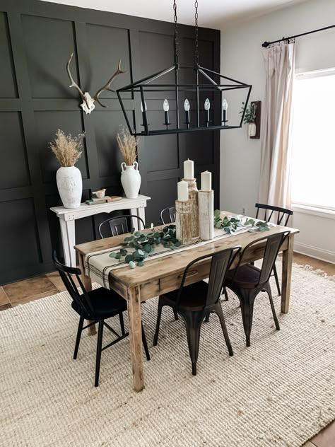 dining room decor | black accent wall | board and batten | vintage dining table | black chairs | jute rug | elk antlers | vases | neutrals | modern lighting | simplicity Dining Room Accent Wall, Серая Кухня, Dining Room Accents, Room Accent Wall, Dining Room Remodel, Dining Room Makeover, Black Dining Room, Dining Room Inspiration, Farmhouse Dining Room