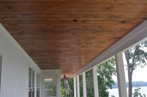 stained beadboard ceiling porch | love this stain. i think it’s called early americana. it’s the ... Stained Beadboard Ceiling, Beadboard Porch Ceiling, Stained Beadboard, Porch Oasis, Walkout Basement Patio, Groove Ceiling, Pergola Plans Design, Porch Wood, Porch Ceiling