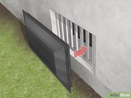 3 Simple Ways to Install Crawl Space Insulation - wikiHow Crawl Space Vent Covers, Crawl Space Cover, Crawl Space Storage, Diy Crawlspace, Crawl Space Vapor Barrier, Crawl Space Vents, Crawl Space Door, Crawl Space Insulation, Insulating A Shed