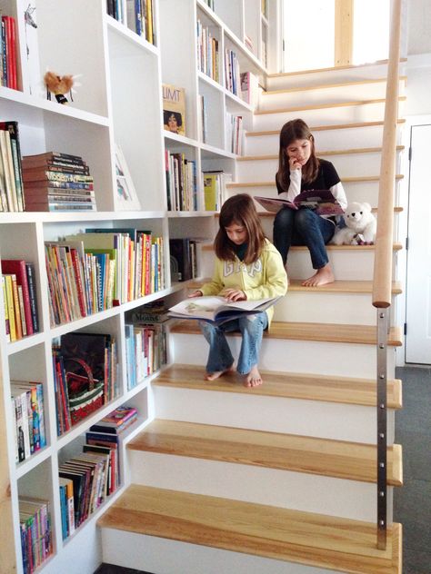 Our new #bookwall will be a popular hang out for sure. #welovetoread #books! #entryway #stairs Bookshelves On Stairs, Books On Stairs, Books Stairs, Stairs Bookshelves, Staircase Bookshelf, Stair Landing Decor, Stair Bookshelf, Stairway Storage, Book Stairs