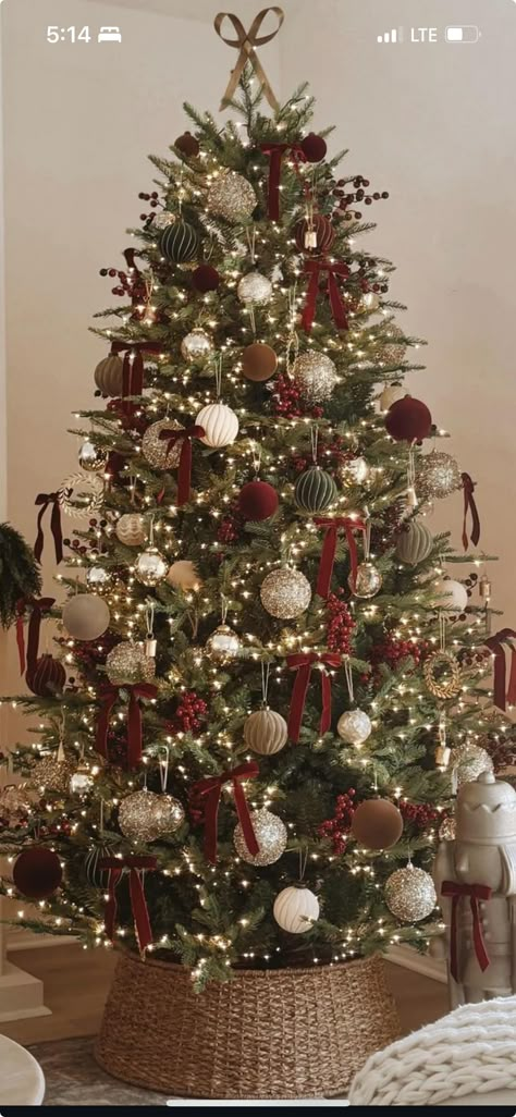 Red Green Brown Christmas Tree, Red Brown Cream Christmas Tree, Red White Burlap Christmas Tree, Poinsettia Christmas Tree Ideas, Burgundy And Neutral Christmas Tree, Muted Christmas Tree, Gold Red And Green Christmas Decor, Christmas Tree With Candy Canes, Red And Tan Christmas Tree