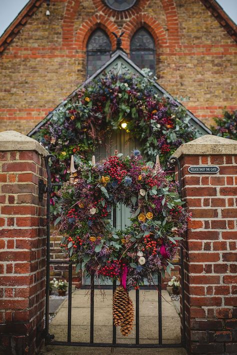 Christmas 2020 at Miss Bush luxury bridal boutique in Surrey, London, UK. A festive floral display at The Chapel, featuring foliage, dried flowers, berries and dried fruit. Photography © Sophie Duckworth Photography. #bridalboutique #bridal #weddingdressshop #retail #styling #flowers #floralarch #festive #christmas #wreath #garland #luxury Christmas Exterior, Front Door Decor Ideas, Christmas Front Door Decor, Door Decor Ideas, Navidad Natural, Christmas Front Door, Front Door Christmas Decorations, Christmas Front Doors, Christmas Door Wreaths