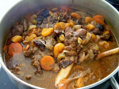 A whole leg of lamb (bone and all) goes into the pot with your standard veggies, lots of garlic, most of the spice cabinet, dried fruit, and a whole bottle of wine! Two and a half hours later it's velvety soft and begging to be spooned over your favourite rice or grain. Mutton Stew Recipes, Mutton Stew, Mutton Dishes, Meat Stew, Goat Recipes, Samuel De Champlain, Beef Food Recipes, Moroccan Lamb, Mutton Recipes