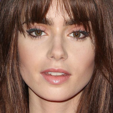 Lily Collins Makeup: Black Eyeshadow, Nude Eyeshadow & Nude Lipstick | Steal Her Style Long Brunette Hair, Layered Hair With Bangs, How To Cut Bangs, Face Shape Hairstyles, Hair Styles 2014, Fringe Hairstyles, Long Hair With Bangs, Auburn Hair, Haircuts For Long Hair