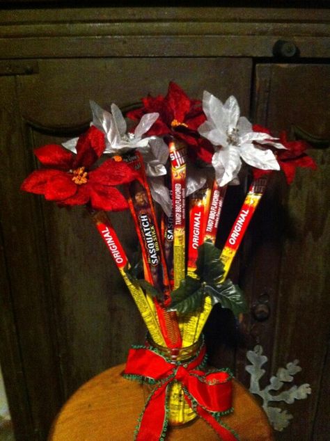 Slim Jim bouquet,  created by my sister, Stephanie. Slim Jim Gift Ideas, Slim Jim Bouquet, Tito’s Bouquet, Jerky Bouquet Diy Gifts, Beef Jerky Bouquet, Shower Baskets, Slim Jim, Slim Jims, Food Decorations