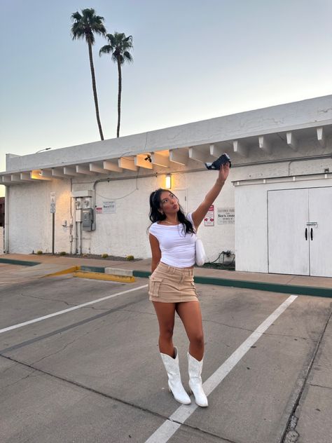 fall aesthetic outfit with cowgirl boots and cargo skirt posing with a digital camera🍂🤍  with palm trees in the back (outfit from @sheinofficial use my reference code USA881 or link in bio for EXTRA $$ off your @shein_us order ( Cargo Skirt Boots Outfit, Cargo Skirt And Boots Outfit, Cargos And Boots, Outfit With Cowgirl Boots, Cute Going Out Outfits, Fall Aesthetic Outfit, Outfit From Shein, Amazon Storefront, Cargo Skirt