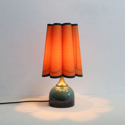 DESCRIPTION: Beautiful lighting can heal all unhappy moods in the day, and Duzy is the same. After creating a new table lamp, when the lamp is turned on, everything is so beautiful. ITEM  DETAILS:  Working voltage range: 110-240V/50-60Hz, Using Worldwide.  Material:        Lampshade: High quality fabric , iron.       Lamp base: Ceramic.  Item's color :       Lampshade: ocher fabric  with dark green trim-62#.       Lamp base: dark green.  Item's diameter :        Diameter : 20 cm ( 8 inches )       Total height: 40 cm (15.7 inches )         The ceramic base diameter : 13cm (5.1 inches )  Plug wire with switch:         In general,  Length-150 cm ( 59 inches ). 3 kinds of different colors-Clear/White/Black.        If you'd like longer length or other color, please send a message if you need . Hand Thrown Ceramic Lamp, Funky Bedside Lamps, Dark Academia Table Lamp, Mid Century Lamp Shade, Funky Table Lamps, Two Lamps On Console Table, Cool Standing Lamps, Stained Glass Lamp Aesthetic, Eclectic Lampshade