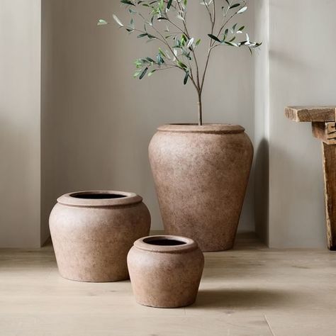 KEY DETAILS Ficonstone in a Sand finish. Has drainage holes. Suitable for outdoor use. Frost-proof. Sold individually. Made in Vietnam. Black Olive Tree, Planter Liners, Modern Planters Outdoor, Outdoor Urns, Olive Plant, Colin King, West Elm Kids, Patio Planters, Urn Planters