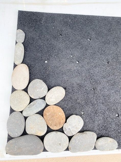 How to create a spa-like feel in your home with this DIY rock mat. Follow this simple tutorial to easily create your own creative piece. Rock Mat, River Rock Crafts, Sauna Kits, Sauna Kit, Smooth Rock, Indoor Sauna, Outdoor Sauna, Diy Shower, Water Bucket