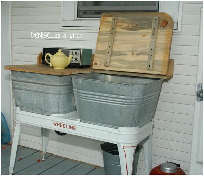 Double wash tub to hold cold drinks. From the Fabulous Farmhouse Tour: On the Back Porch Galvanized Wash Tub, Farmhouse Tour, Galvanized Tub, Outdoor Sinks, Tub Ideas, Country Porch, Side Porch, Wash Tubs, Farmhouse Ideas