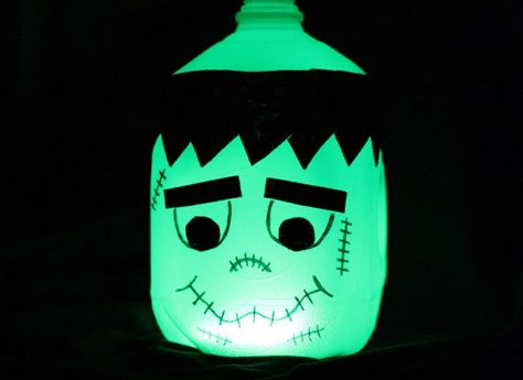 Glow in the Dark Frankenstein Milk Jug - Crafts by Amanda Halloween Milk Jugs, Frankenstein Craft, Milk Jug Crafts, Jug Decor, Halloween Camping, Crafts By Season, Lantern Craft, Halloween Front Porch Decor, Halloween Porch Decorations